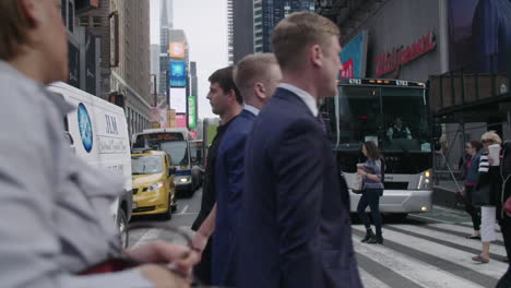 Slow-motion-profile-shot-of-pedestrians-on-a-busy-sidewalk-in-Manhattan