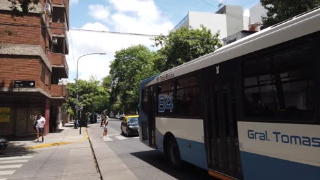 A-Public-Autobus-Bus-of-line-84-Rides-the-South-American-Sunny-Streets-in-Summer