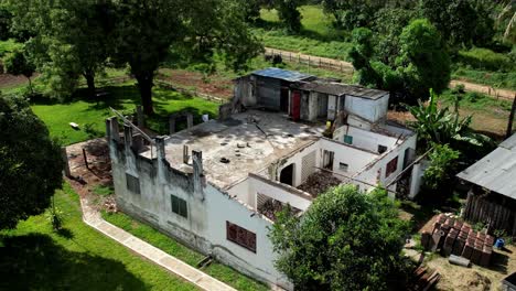 Aerial-view-over-the-ruins-of-an-abandoned-house