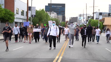 People-With-Masks-on-Black-Lives-Matter-March-in-Los-Angeles,-USA,-Slow-Motion