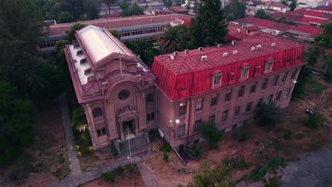 Aerial-view-dolly-in-at-the-medical-school-of-the-south-campus-of-the-University-of-Chile-in-Santiago---Old-architecture