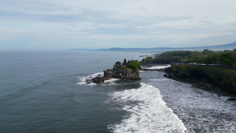 Tanah-Lot-Temple-With-Crashing-Waves-Slow-Track-Inwards-Bali-Indonesia