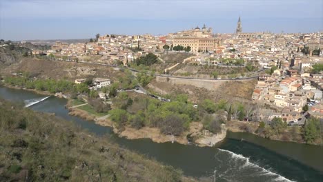 Panorama-View-of-Toledo-and-river-Tajo,-from-Mirador-de-La-Valle-in-a-sunny-spring-day