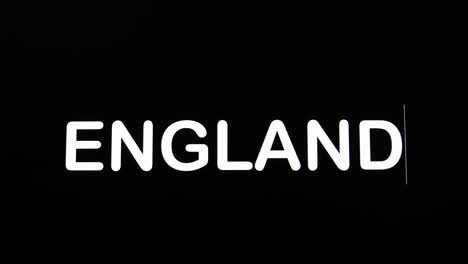 Typing-the-word-England-on-a-screen-with-a-black-background