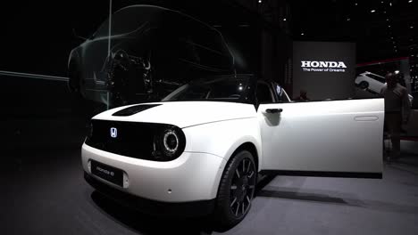 Geneva,-Switzerland---March-12th,-2019:-wide-slow-motion-shot,-Honda-announces-electric-car-premiere-for-Autosalon-Geneva-Motor-Show-2019