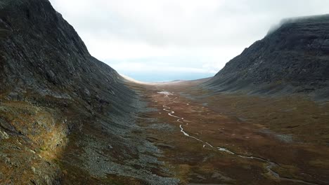 A-slow-flight-through-the-majestic-Stora-do-rren-valley-with-it-massive-rock-walls-and-the-meandering-river
