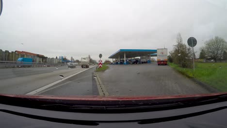 Car-driving-into-a-fuel-station-in-a-highway-in-Germany