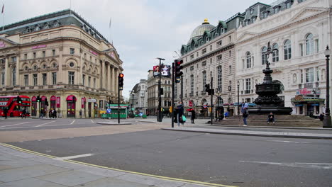 Empty-tourist-attraction-and-roads-in-London-in-Covid-19-Coronavirus-lockdown-at-Piccadilly-Circus,-with-quiet-streets-in-the-West-End-during-the-pandemic-in-England,-Europe