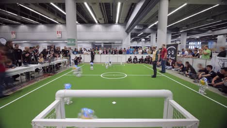 Time-lapse-Of-Robocup-Tournament-Viewed-Behind-Goal-Post