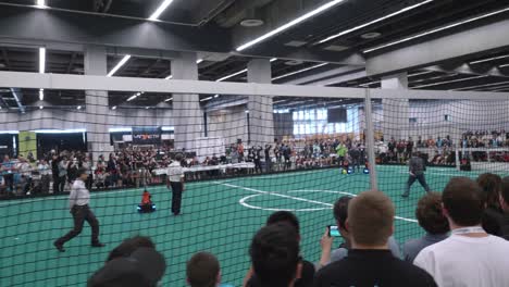 Follow-Shot-Behind-Crowds-At-Robocup-Tournament-Taking-Place-In-Montreal