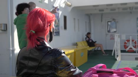 Red-hair-girl-wind-blow-on-ferry