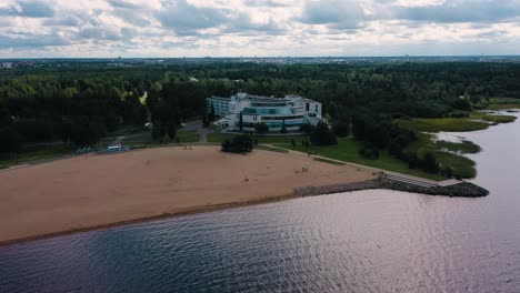 Aerial-drone-view-towards-the-Eden-spa-and-hotel,-summer-day,-in-Oulu,-Finland