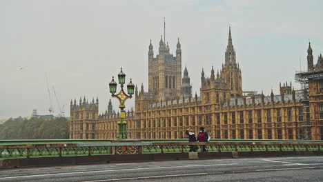 London-in-Coronavirus-Covid-19-lockdown-with-empty-quiet-deserted-roads-and-streets-with-no-cars-or-traffic-at-Westminster-Bridge-with-Houses-of-Parliament-in-England,-UK-at-rush-hour