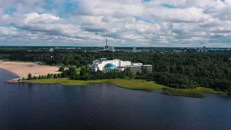 Aerial-view-around-the-Eden-spa-and-hotel,-summer-day,-in-Oulu,-Finland---Circling,-drone-shot