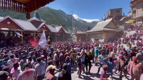Festival-Of-Spring-Being-Celebrated-By-Indian-Locals-With-Vibrant-Colors,-Puppet-And-Flags-Waving-On-The-Event-In-Sangla-Village,-Spiti-Valley,-Himachal,-India