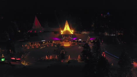 Aerial-view-of-the-Santa-Claus-Village,-at-the-arctic-circle---pull-back,-drone-shot
