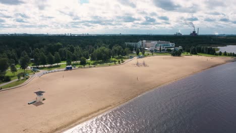 Aerial-drone-view-towards-the-Nallikari-beach-and-the-Eden-spa,-in-Oulu,-Finland