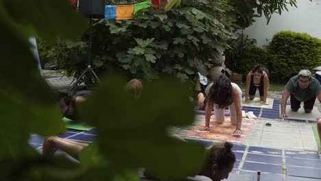 People-Practicing-Yoga-Together-Outdoor-In-Green-Nature,-Stretching-Body,-Lima,-Peru
