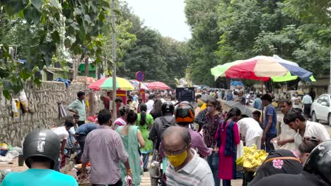 Walking-in-crowded-open-market.-Mumbai,-India.-Gimbal