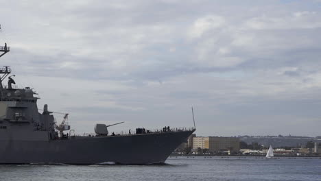 Large-naval-carrier-passing-by-downtown-San-Diego