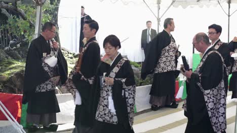 Japanese-priest-getting-prepared-for-ceremony