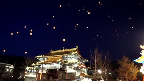 Gubei-Water-Town-New-Chinese-Year-Celebration-2020,-artificial-lanterns-flown-by-drones-fly-to-the-sky