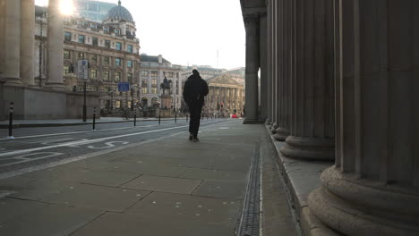 Empty-roads-and-quiet-streets-with-almost-no-people-and-no-traffic-during-the-Coronavirus-pandemic-Covid-19-lockdown,-taken-at-rush-hour-at-Bank-in-the-City-of-London,-England,-Europe