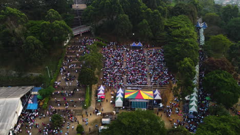 Aerial-view-of-a-fair-at-the-Yaoundé-Conférence-Centre,-in-cloudy-Cameroon,-Africa