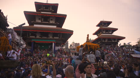 Pagoda-style-temple-at-Kathmandu-Nepal,-ethnic-diversity,-Indra-Jatra-festival,-crowd-enjoying-drone-shot-4K