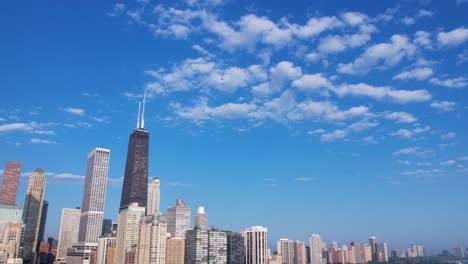 Timelapse-Of-City-Skyline-With-Puffy-Clouds