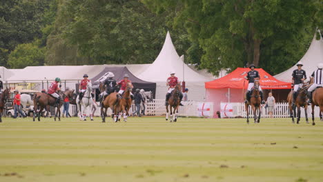 Polo-players-on-horseback-shake-hands-and-congratulate-each-other-after-match-is-over