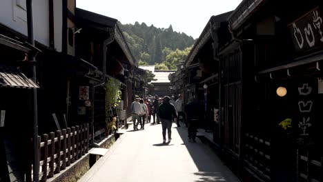 People-Walking-Along-Narrow-Old-Town-Sannomachi-Street