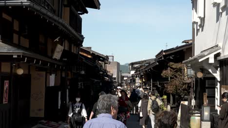 Tourists-And-Visitors-Walking-Along-Narrow-Old-Town-Sannomachi-Street
