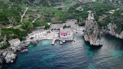 Aerial-drone-shot-over-Scopello-village-during-sunset