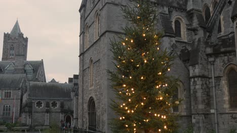 The-exterior-of-the-Cathedral-in-Dublin-city-with-christmas-tree-in-the-garden