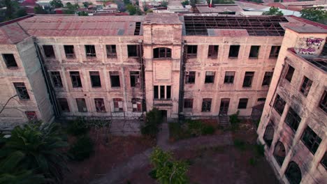 Drone-flyover-Abandoned-complex-of-former-maternity-of-the-Hospital-Barros-Luco-Trudeau,-Santiago