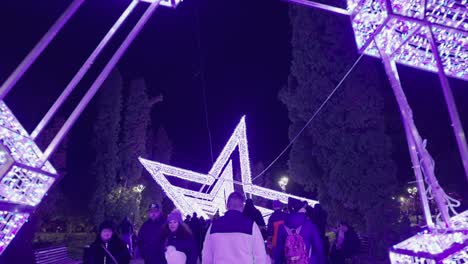 People-Walking-Through-Giant-Stars-Tunnel-With-LED-Lights