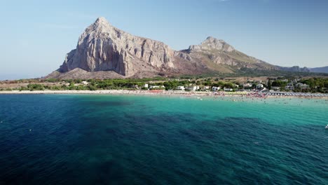 Aerial-drone-shot-at-the-beach-of-San-Vito-Lo-Capo-in-Sicily-during-daytime