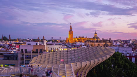 Tourists-At-Famous-Setas-de-Sevilla-At-Sunset-In-Seville,-Spain