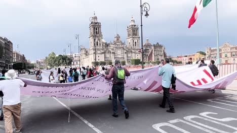 shot-of-a-manifestation-in-mexico-city-zocalo-in-front-of-the-cathedral