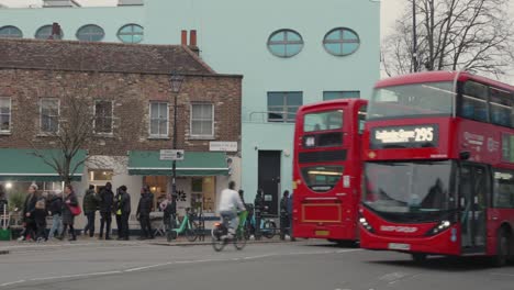 The-typical-double-decker-buses-on-the-streets-of-Fulham,-London,-United-Kingdom