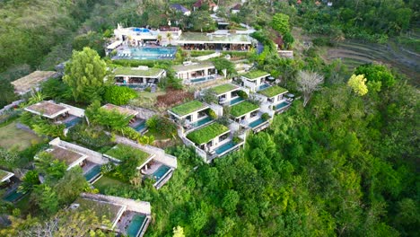 Aerial-View-of-Group-of-Private-Villas-Nested-on-Hilltop-in-Maua-Resort-Nusa-Penida-Klungkung-Regency,-Bali-Indonesia