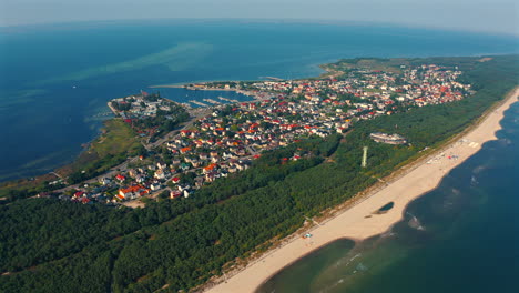 Aerial-panoramic-view-of-drone-flying-above-the-Jastarnia-city-located-on-Hel-penisula-in-Poland