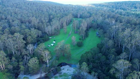 Drone-aerial-landscape-of-bushland-campground-forest-property-acreage-trees-tent-travel-tourism-Eden-Nethercote-South-Coast-Australia