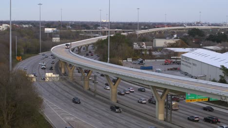 Aerial-of-cars-traveling-on-I-45-North-freeway-near-downtown-Houston
