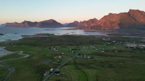 Aerial-View-of-Fredvang-Village-during-sunset-in-Lofoten-Islands,-Norway---Aerial-Circling