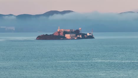 Subject-aerial-view-of-Alcatraz-Island-in-the-San-Francisco-Bay,-USA-at-dawn