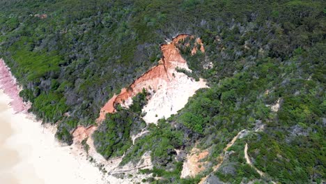 Drone-aerial-landscape-bushland-Pinnacles-rock-formation-sandy-ocean-beach-holiday-destination-Sapphire-coast-South-Coast-Eden-NSW-Australia
