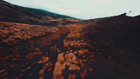 FPV-drone-flying-fast-at-Etna-volcano-close-to-the-ground