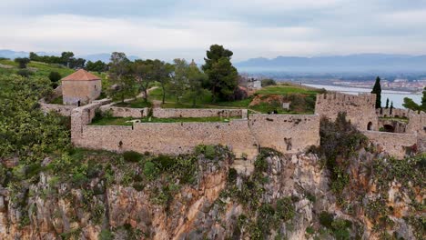 Side-Aerial-View-of-the-Historic-Fortress-of-Akronafplia-in-the-Peloponnese-Region,-Greece
